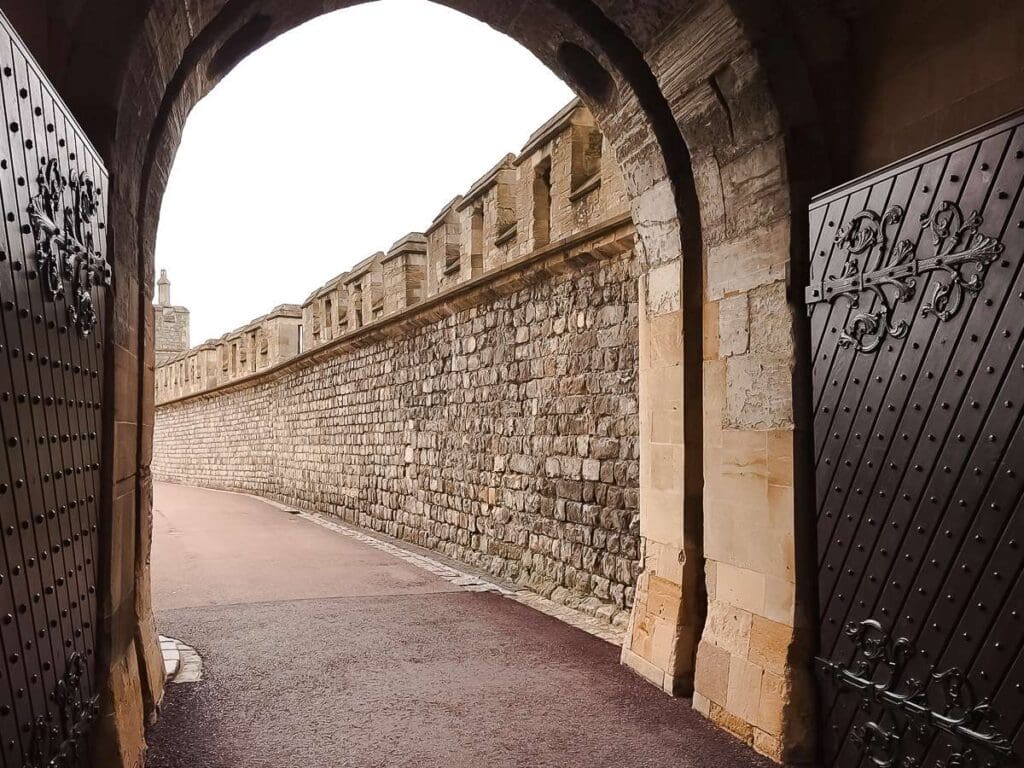 Inside Windsor Castle - The Norman Gate with a view of the outside.