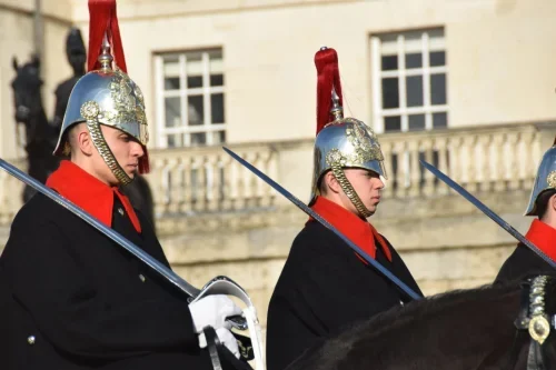 Image of the King's Guards, representing the "The Crown" TV series from Netflix tour. The Crown Tour of London by Brit Movie Tours.